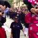 Tyrone Lowe Jr. walks to the 49th Precinct station house in the Bronx, N.Y., hand in hand with Mickey and Minnie Mouse.
New York Post Video Screenshot